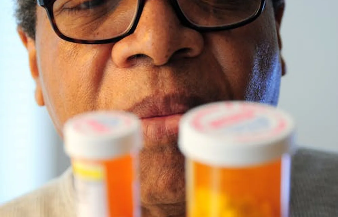 Professional pharmacist administering vaccinations at AV Chemist in Queens, NYC