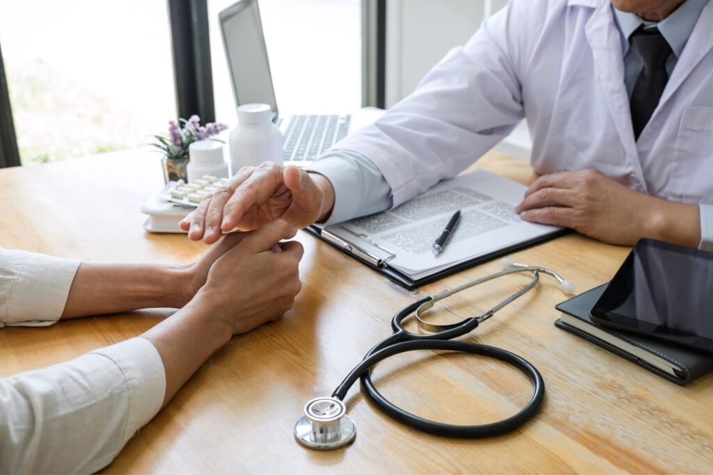 Professional handshake between AV Chemist representative and attorney establishing partnership for personal injury pharmacy services