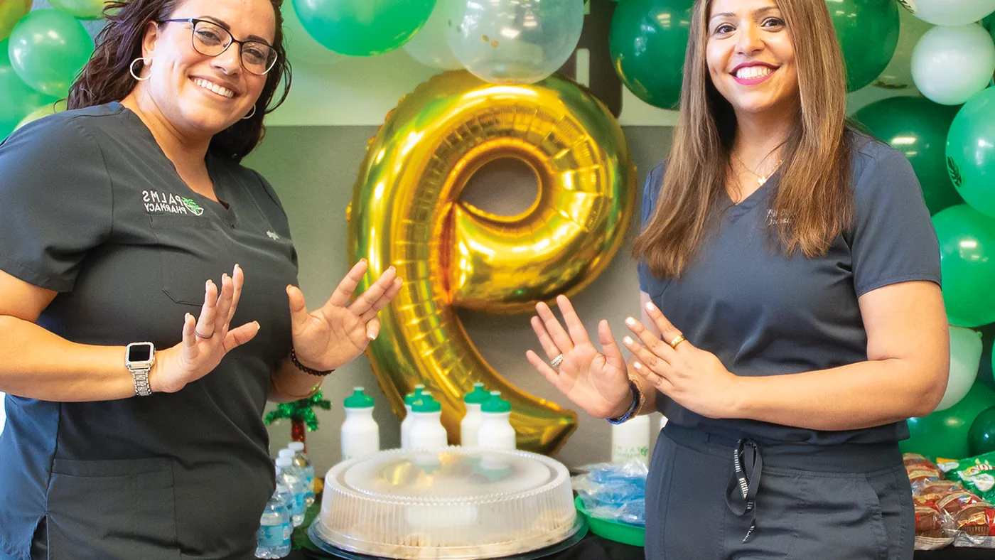 Pharmacist discussing natural pain relief supplements with patient